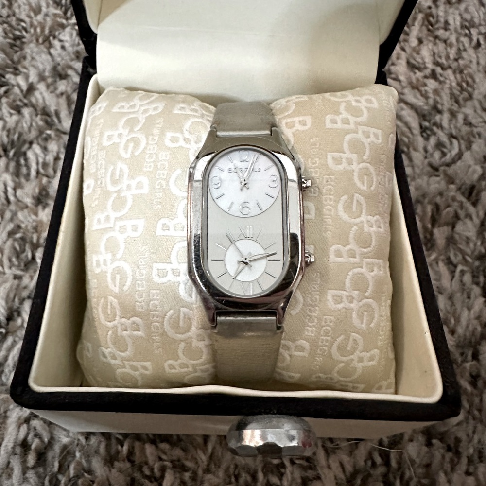 BCBG Girls Wristwatch, silver w/ two clock faces. Needs new battery & wristband